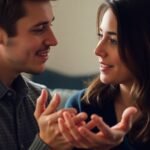 Two people conversing intimately.